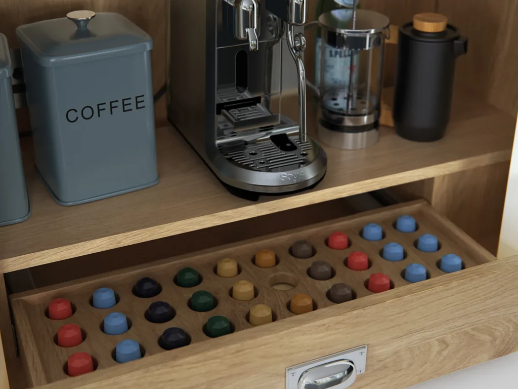Oak-lined coffee station with a pull-out capsule drawer inside a bespoke larder cupboard